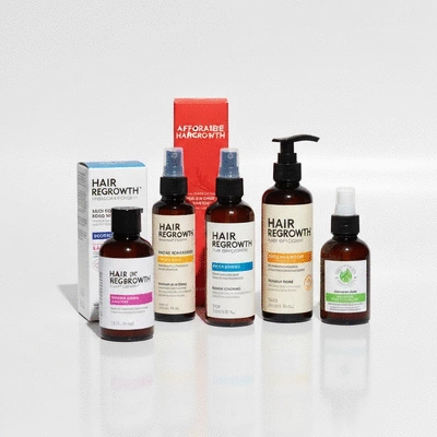 Assortment of affordable hair regrowth product bottles and packaging